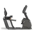 Compact recumbent exercise bike with supportive seat and back pad
