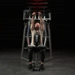 Hammer Strength Plate-loaded high row with overhand grip and storage horns