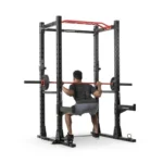 Inspire Fitness FPC1 Home gym strength rack with dip handles, safeties, and band attachments