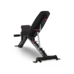 Inspire Fitness SCS Heavy-duty workout bench with leg hold-down bar and rear transport wheels