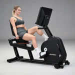 Recumbent exercise bike with step-through design and lumbar support seat