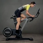 Ride Smart Side view of Technogym indoor cycling bike with dual-sided pedals