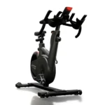 Studio bike with dual-sided pedals and rear aluminum flywheel