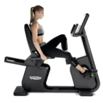 Technogym Artis Recline exercise bike with smart pedals and easy-access frame