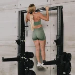 Technogym Personal Chrome strength training rack with pull-up bar and integrated storage supports