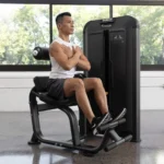 Vision Keystone Selectorized lower back machine with dual foot bars and instructional placards